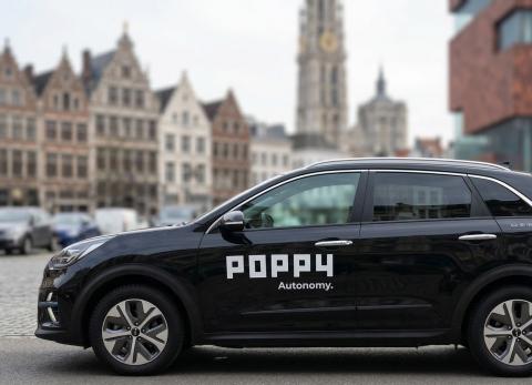 Poppy deelwagen in stedelijke omgeving