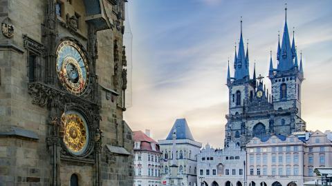 un grand bâtiment avec une horloge sur le côté